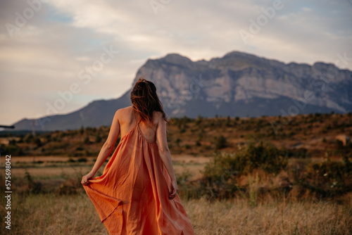 woman in orange dress