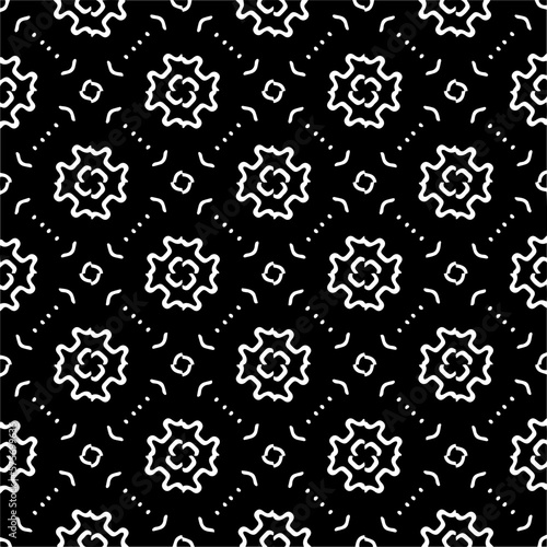 Vector geometric ornament in ethnic style. Seamless pattern with abstract shapes,Black and white color. Repeating pattern for decor, textile and fabric.