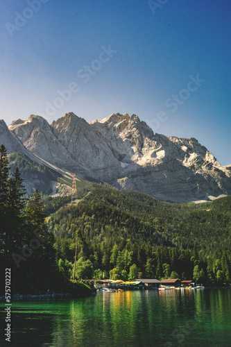Picturesque mountain landscapes in summer  inviting for hiking with views of the highest peaks of the Alps. Mountain sports enthusiasts and hikers immediately have wanderlust