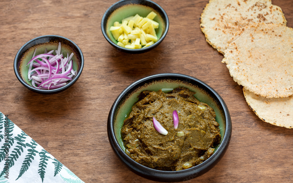 Sarson ka saag traditional Indian dish with corn bread (Makki di roti