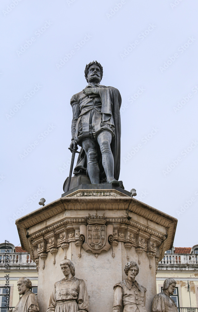 Tall bronze statue of Luis de Camoes writer in Lisbon