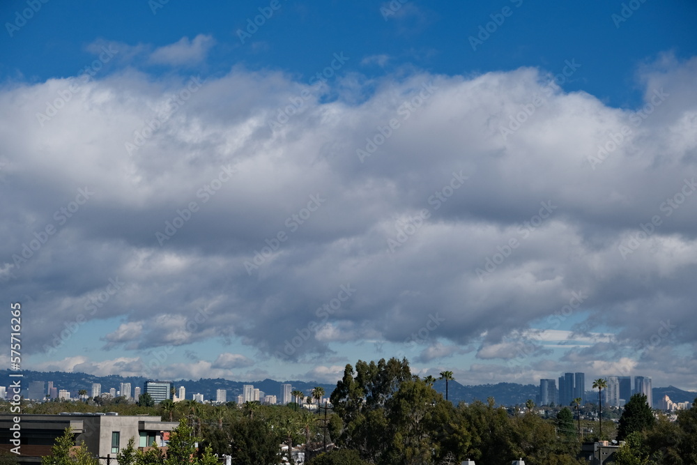 los angeles skyline and mountain range on a cloudy but beautiful sunday morning