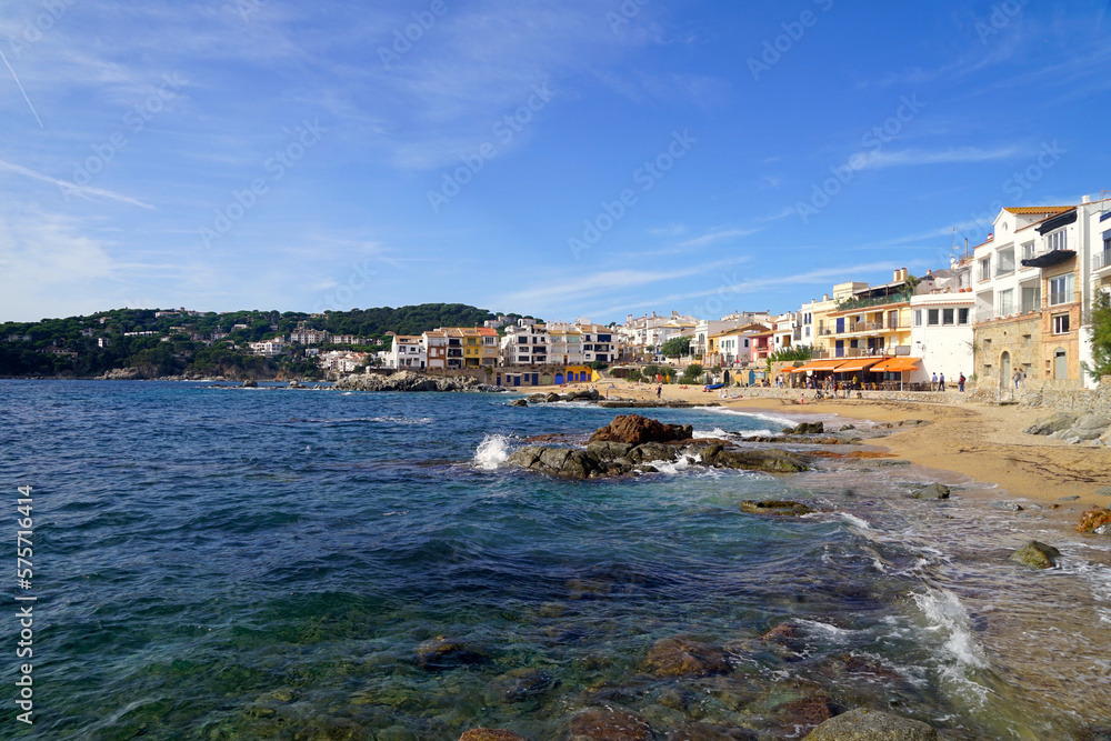 view to the beaches and coast in Calella de Palafrugell, where the historic houses rise to the sea, Costa Brava, Girona, Catalonia, Spain	