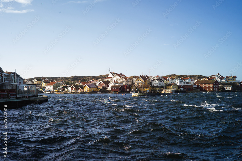 Sweden, Swedish lifestyle with typical Swedish red houses and small cottages. It is cold and typical scandinavian weather on the shear coast.