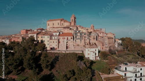 aerial view from the drone of the medieval village of Monteprandone in the province of Ascoli Piceno in the Marche region. The village overlooks the hills below and enjoys a beautiful sea view photo