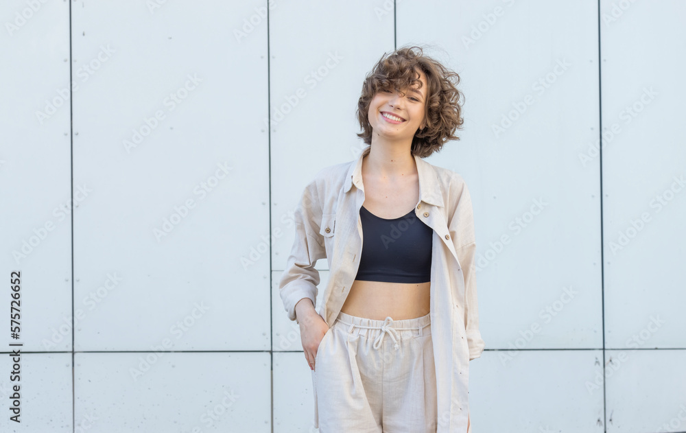 Portrait happy woman 25 years old. Urban style. Portrait happy woman 25 years old. Urban style.