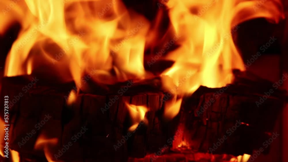 Tight Shot Of Wood Burning In Fireplace Insert With Swirling Flames
Tight Shot Of Wood Burning In Fireplace Insert With Swirling Flames