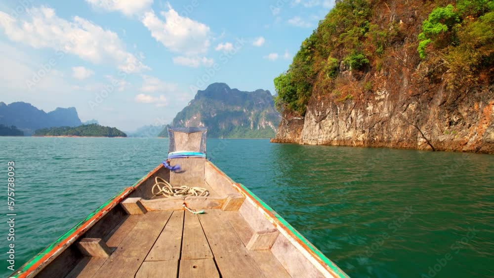 Discover beauty on a longtailed boat tour of a serene lake surrounded
