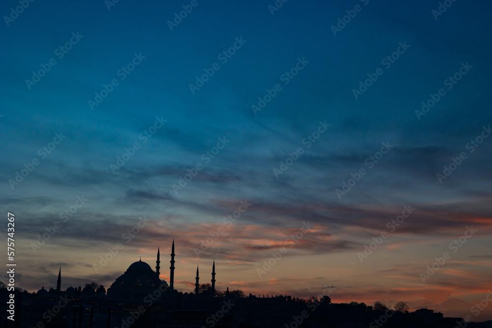 Ramadan or islamic concept photo. Silhouette of Suleymaniye Mosque at sunset.
