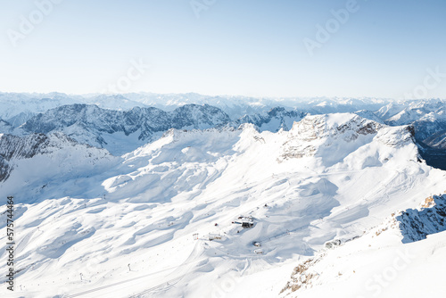 A mountain panorama with a view of the Alps and the Zugspitze with a mountain lake. A picturesque landscape that reflects the beauty of the German mountain. 