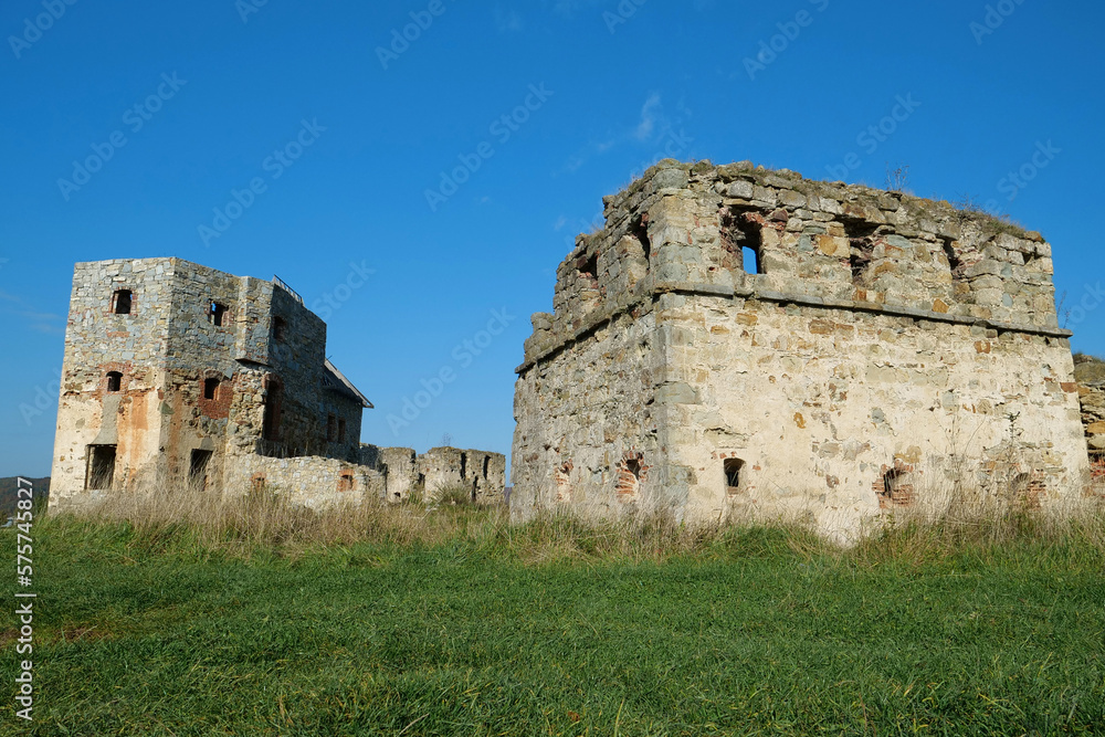 Ancient stone towers in Pniv Castle - medieval historical object, Ukraine