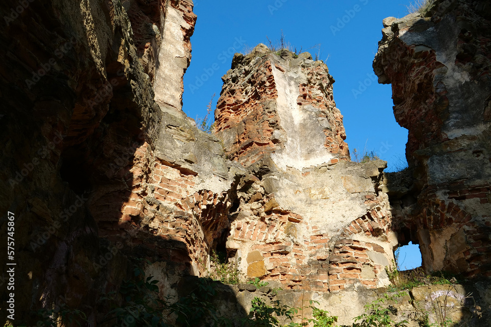 Stone ruins in Pniv Castle - medieval historical object in western Ukraine