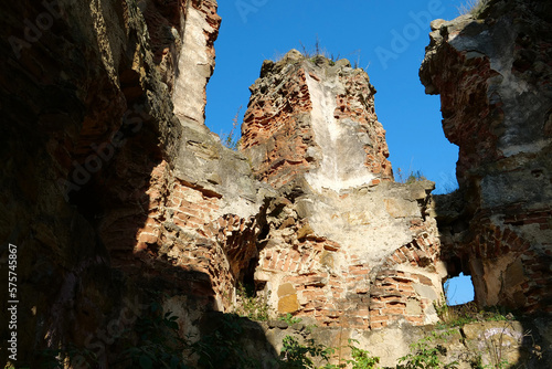 Stone ruins in Pniv Castle - medieval historical object in western Ukraine