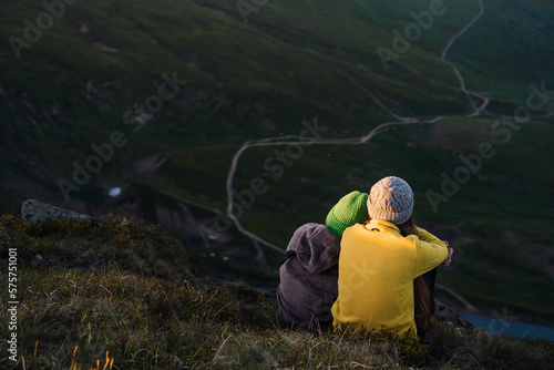 People are looking at beautiful mountain view photo