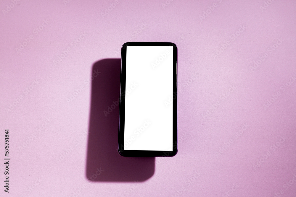 Smartphone with white screen on top of a pink table. Cell phone concept. White screen concept. png Smartphone with white screen on top of a pink table. Cell phone concept. White screen concept. png