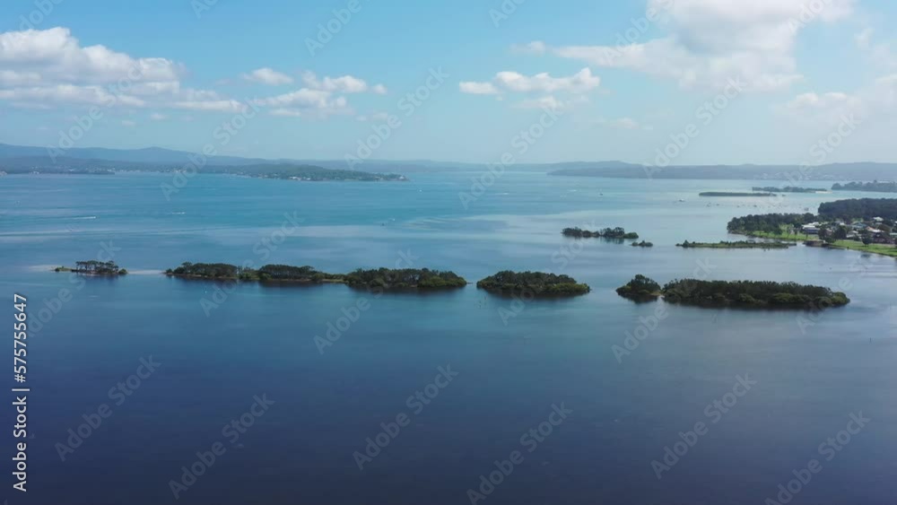 Islands on Macquarie Lake in Australia at Swansea coastal town – aerial 4k.
Islands on Macquarie Lake in Australia at Swansea coastal town – aerial 4k.