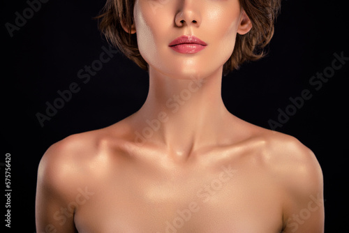 Closeup studio photo gorgeous half naked woman demonstration perfect shaped body silky highlighter skin collar bone