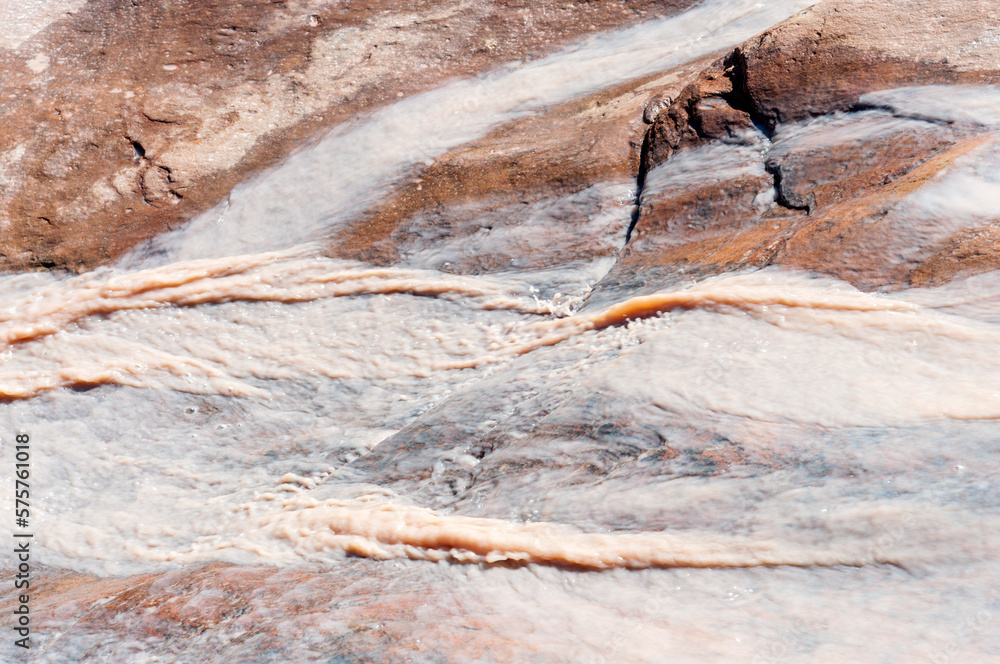 Abstract patterns in a desert runoff stream