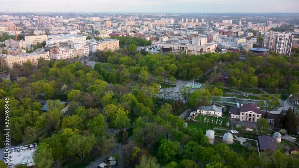 Aerial modern city park with fountains cascade in green spring Shevchenko City Garden. Recreation in Kharkiv, Ukraine