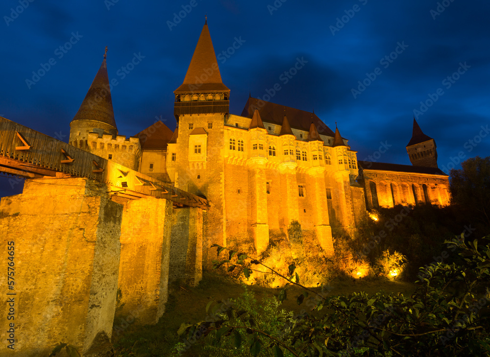 Image of Corvin Castle on the sunset in Romania.