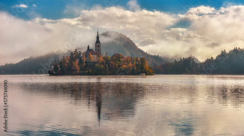 Blejski Otok _ Lake Bled is located in north-western Slovenia. They are distinguished by the fact that the island of Blejski Otok is located on its surface. It is on it that the well-known pilgrimage 