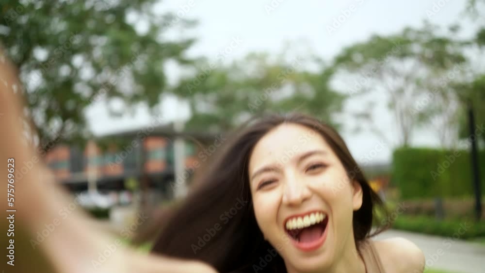 Candid Happy feeling of Beautiful Young Woman smiling outdoor in sunlight. Pretty face of female and beautiful smile. Candid Happy feeling of Beautiful Young Woman smiling outdoor in sunlight. Pretty face of female and beautiful smile.