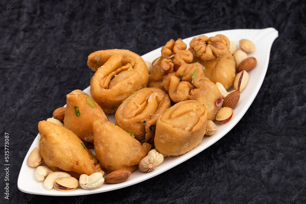 Various Indian Sweet Dumpling Khoya Mithai - Kalash Gujiya, Samosa Karanji, Lavang Lata, Laung Latika, Potli Gujia Also Called Pirukiya, Pirukia, Basundi, Gughra For Deepawali, Teez Holi, Diwali, Teej Various Indian Sweet Dumpling Khoya Mithai - Kalash Gujiya, Samosa Karanji, Lavang Lata, Laung Latika, Potli Gujia Also Called Pirukiya, Pirukia, Basundi, Gughra For Deepawali, Teez Holi, Diwali, Teej