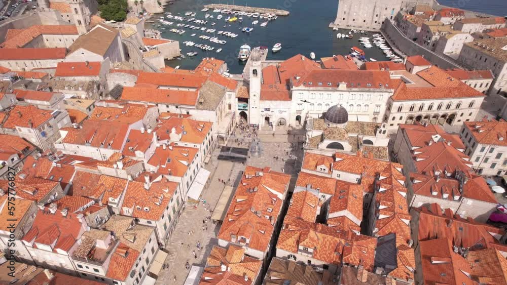 Dubrovnik Old Town and Harbor, Croatia. Aerial View of Buildings and Stradun Street Dubrovnik Old Town and Harbor, Croatia. Aerial View of Buildings and Stradun Street