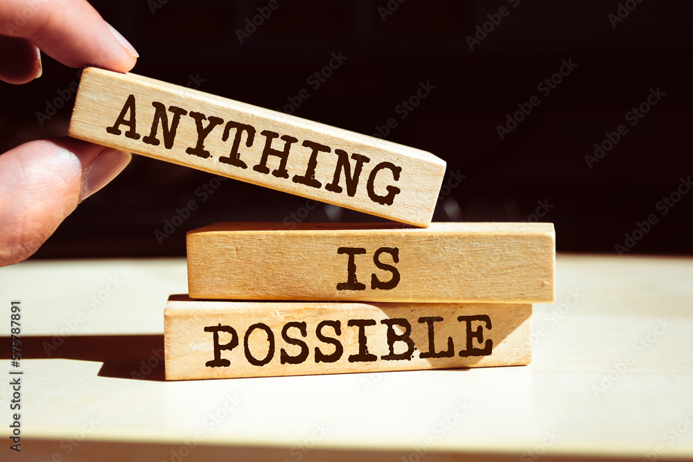 Wooden blocks with words 'Anything is Possible'. Wooden blocks with words 'Anything is Possible'.