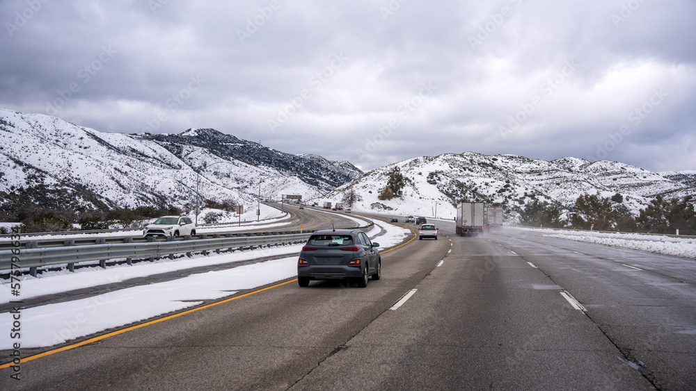 Winter storm snow driving on I-5 freeway Grapevine California USA Feb 26 2023 Winter storm snow driving on I-5 freeway Grapevine California USA Feb 26 2023