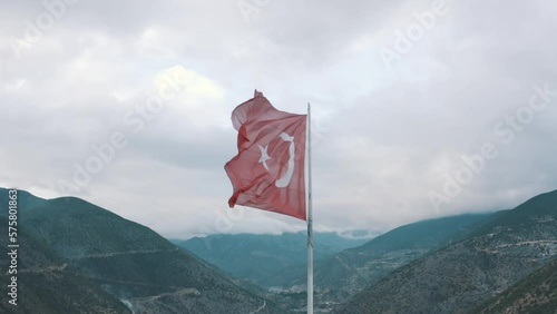 Aerial view of Turkish flag with Gumushane city backgrund. 4K Footage photo