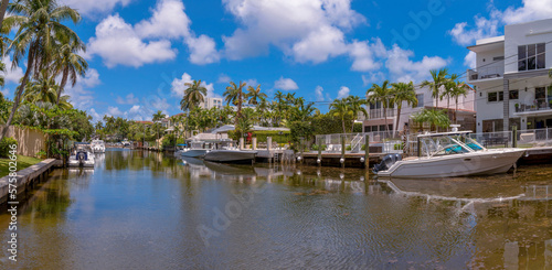 Waterfront houses with boats along the Biscayne Bay in Miami Beach Florida. Beautiful homes overlooking a scenic lagoon in the ntracoastal Waterway.