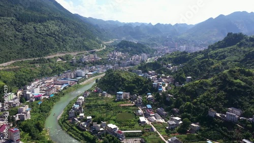 Village aerial in Hubei Province, Hefeng County, above the Loushui river. photo