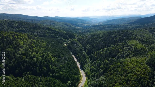 Cinematic aerial shot of an endless mountain and forest landscape in southern Slovenia photo