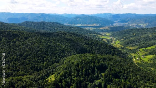 Cinematic aerial shot of an endless mountain and forest landscape in southern Slovenia photo