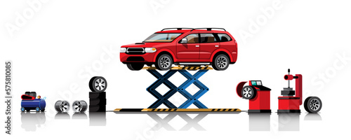 Automobile on hoist for repair and maintenance in garage