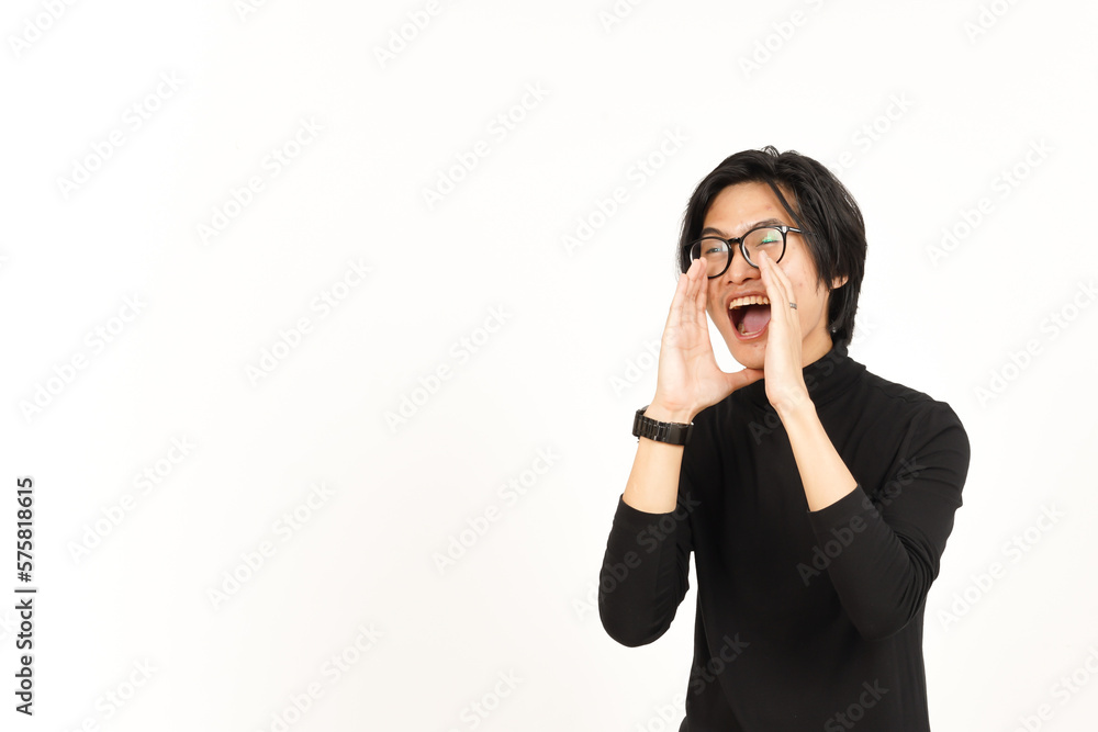 Announcement with hands over mouth Of Handsome Asian Man Isolated On White Background Announcement with hands over mouth Of Handsome Asian Man Isolated On White Background