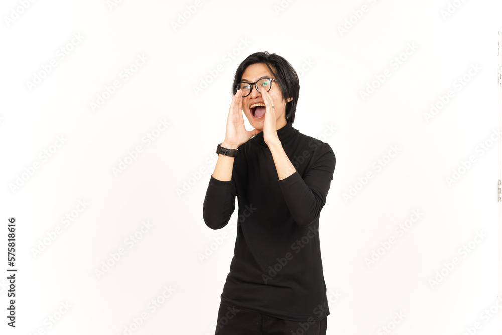Announcement with hands over mouth Of Handsome Asian Man Isolated On White Background Announcement with hands over mouth Of Handsome Asian Man Isolated On White Background
