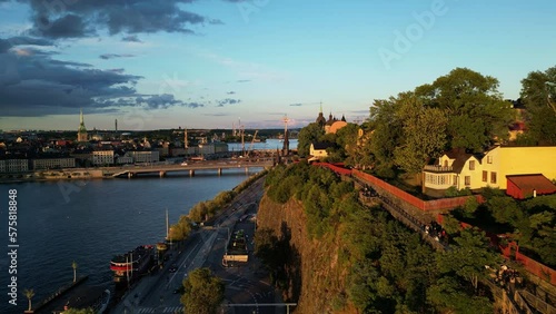 Södermalm, Stockholm. Mariaberget in golden hour. Pull back aerial shot. photo