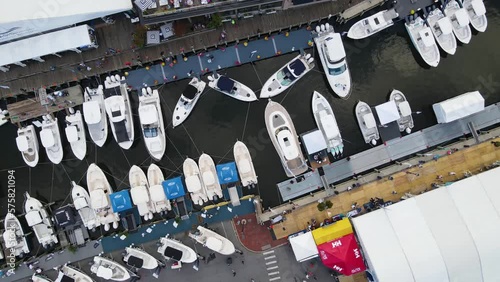 Spiraling down to some amazing boats that are docked up for the boat show.