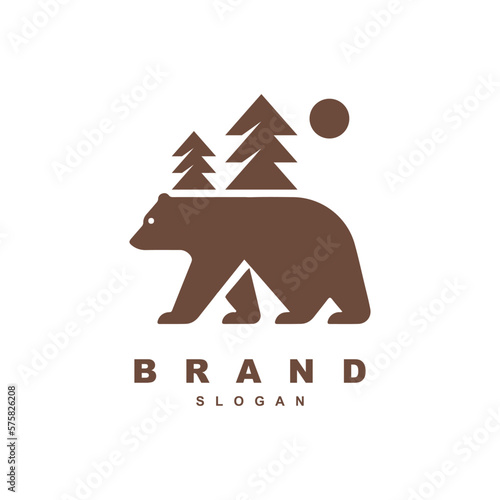 Silhouette bear with pine tree logo design