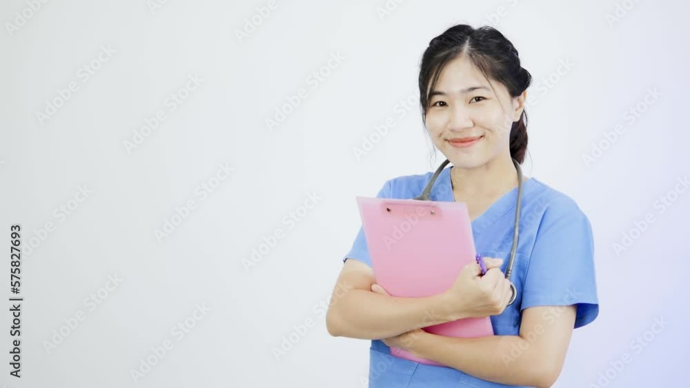 Asian female nurse taking pride in her profession. Asian female nurse taking pride in her profession.