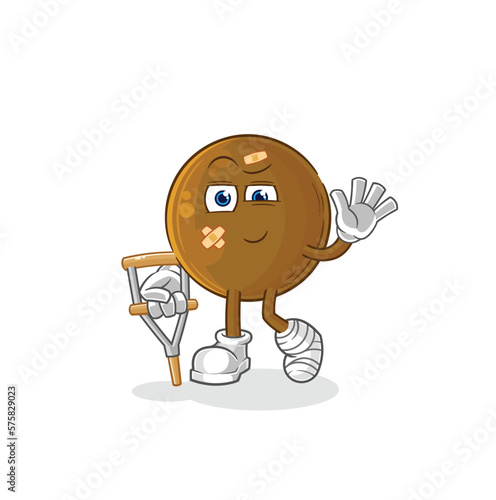 avocado stone sick with limping stick. cartoon mascot vector