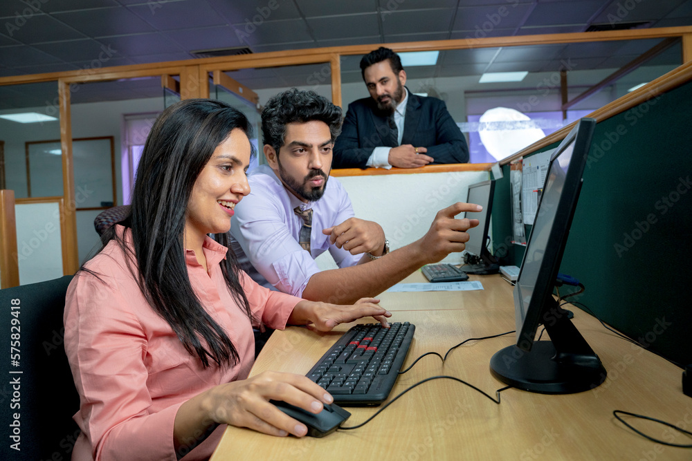 Indian corporate employee working at office Indian corporate employee working at office