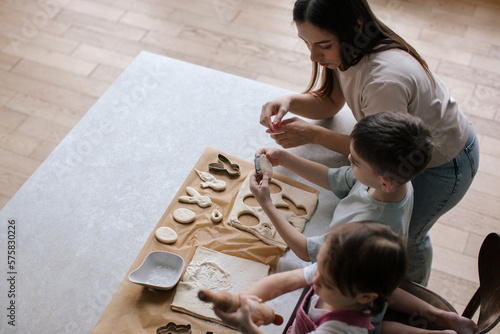 Lifestyle photo of cooking Easter decor. Family time. Under celebrated moment. View from above.