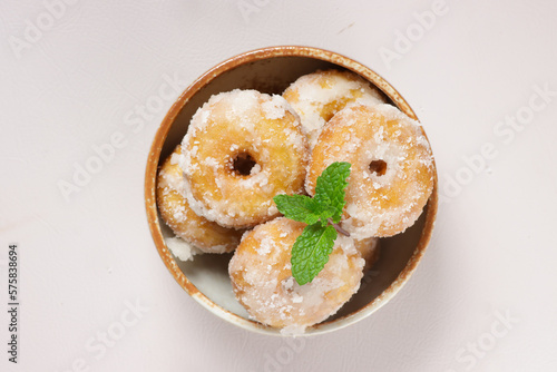 Kuih Keria or Kuih Gelang is Malaysian Traditional Snack made from Fried Sweet Potatoes, Coated with sugar. photo