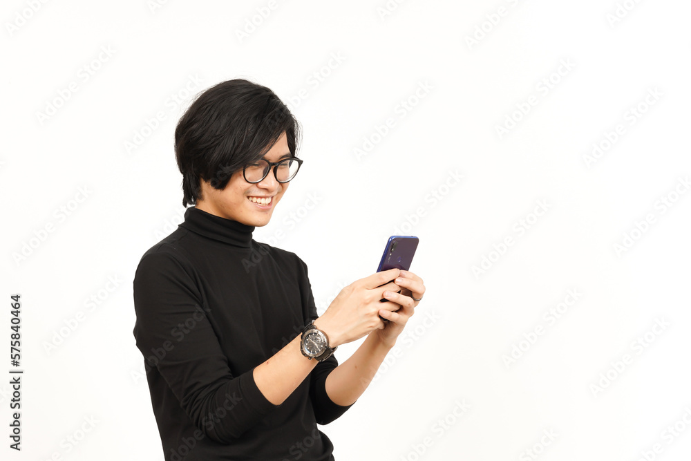 Holding and Using Smartphone with Smiling Face Of Handsome Asian Man Isolated On White Background Holding and Using Smartphone with Smiling Face Of Handsome Asian Man Isolated On White Background