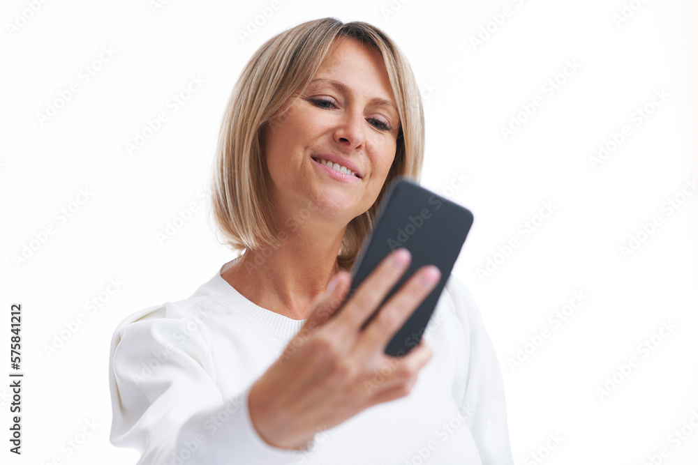 Picture of blonde woman over back isolated background with mobile phone Picture of blonde woman over back isolated background with mobile phone