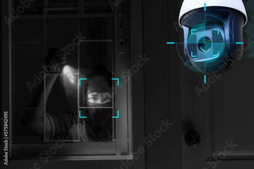 Obraz na plátně CCTV Camera Showing A Burglar Stealing Things In The House