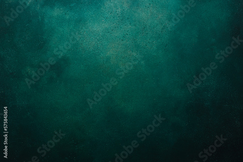 Matte green texture or background with stains, waves and grain elements. Image with place for text. Template for design